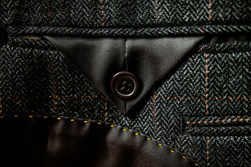 detail of a gray man suit