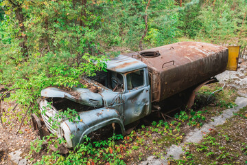 old car broken by marauders in pripyat