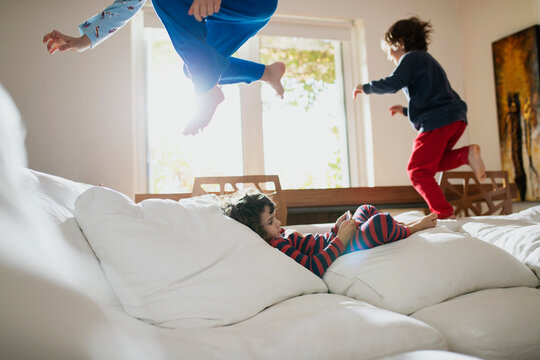 Two year old boy looking a smartphone