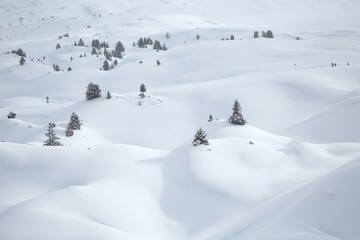 Fototapeta na wymiar Snowy white mountain landscape in winter