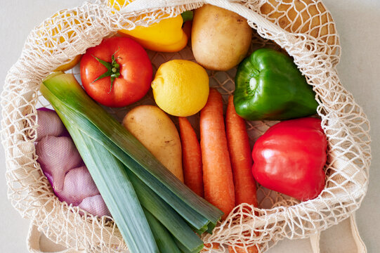 Reusable bag of vegetables on a counter
