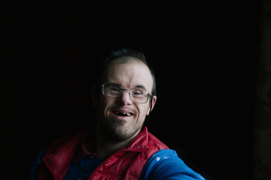 Portrait of middle aged man with Down syndrome