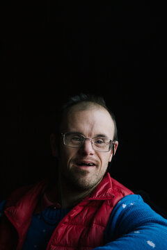 Portrait of middle aged man with Down syndrome