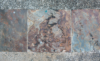 Decorative square-shaped paving tiles. Background, textures imitating natural stone