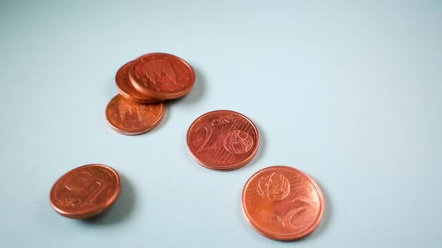 1 and 2 euro cent coins falling in slow motion. Suitable for the Uniform rounding rules for cash payments and circulation of 1 and 2 cent coins public consultation from european comission.