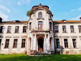 ZHELUDOK, BELARUS - SEPTEMBER 12, 2020: The abandoned manor of Svyatopolk-Chetvertinsky, built in the early 20th century. Popular tourist attraction in Belarus - 384870847