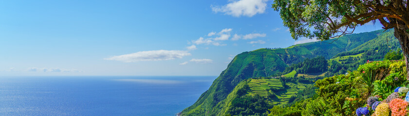 Panorama Viewpoint Ponta do Sossego, Sao Miguel Island, Azores, Portugal. View of mountain and the ocean. Nordeste