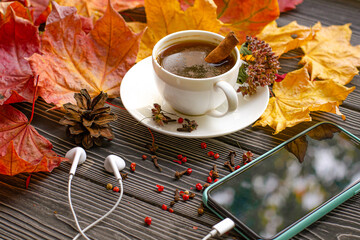 Coffee break with a Cup of aromatic coffee with spices - cinnamon, cloves and red pepper. Autumn...