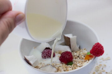healthy Breakfast oatmeal porridge and fruit berries on a white background