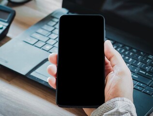 Man hand holding smart phone. business concept