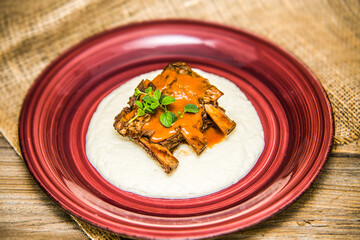 Pork ribs with mashed potatoes. The food in the restaurant. Food styling and restaurant meal serving.