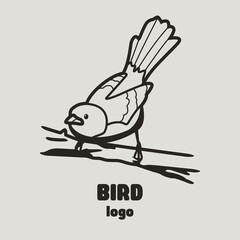 The logo of a bird sitting on a branch and looking at us.  Bird logo symbolizing freedom