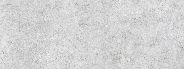 Fototapeta na wymiar Abstract light grey plastered textured grunge background, horizontal banner, in the form of a rough covered stucco wall, closeup