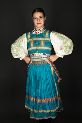Slovak folklore. Traditional costume. Beautiful girl in traditional dress.