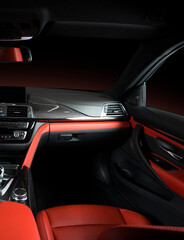 Modern luxury car Interior - steering wheel, shift lever and dashboard. Car interior...