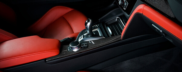 Modern luxury car Interior - steering wheel, shift lever and dashboard. Car interior luxury inside....