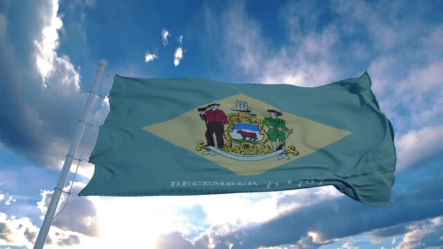 Delaware flag on a flagpole waving in the wind in the sky. State of Delaware in The United States of America