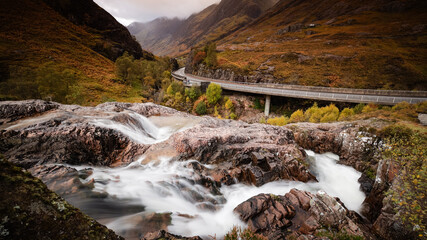 long exposure shot of the waterfalls near the entrance to glencoe and rannoch moor in the argyll region of the highlands of scotland during summer