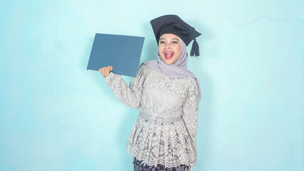 Beautiful asian muslim college graduate with degree