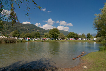 View of the gulf of Agno and a campsite in Switzerland