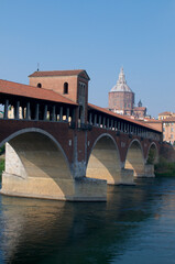 Naklejka premium View of the Ponte Coperto bridge and the Cathedral of Pavia