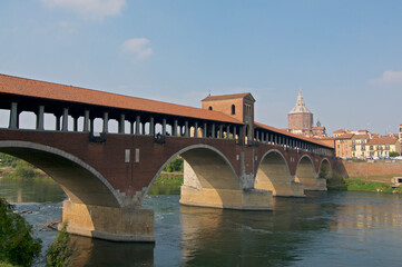 Fototapeta na wymiar View of the Ponte Coperto bridge and the Cathedral of Pavia