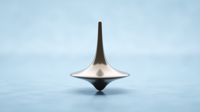 Spinning top on a table