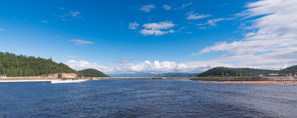 Summer landscape with a road bridge across the Turka River near its confluence with Lake Baikal
