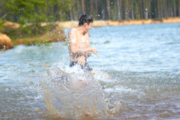 splashing water in the lake in nature entertainment