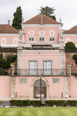 Beautiful view to pink old historic city buildings in central Lisbon