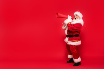 Santa Claus screaming through megaphone