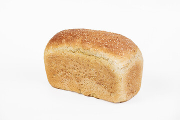 Bakery product. Fresh white molded bread with sesame seeds isolated on white background. Top view and copy space for text.