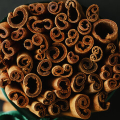 Bunch of cinnamon sticks with ribbon
