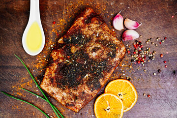 Raw chicken, pork and beef seasoned with spices and vegetables