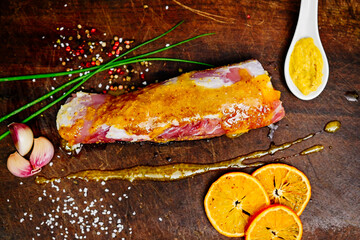 Raw chicken, pork and beef seasoned with spices and vegetables