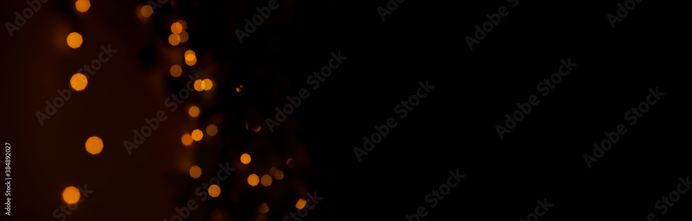 Wall mural garland illumination festive simple background wallpaper pattern concept of yellow lighting bokeh on