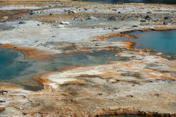 Hot Springs and gushing Geysers at Yellowstone National Park wilderness area atop a volcanic hot spot. USA.