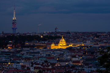view of the roofs of buildings in the city of prague and the enlightened national museum from 1818...