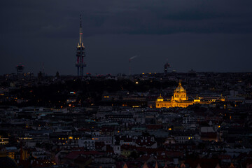 view of the roofs of buildings in the city of prague and the enlightened national museum from 1818...