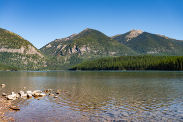 Holland Lake and Falls trail in Flathead National Forest, Montana. USA. Back to Nature concept.