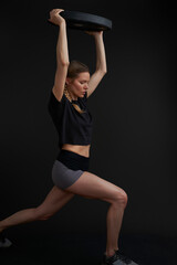 Fototapeta na wymiar Fitness model demonstrates movement