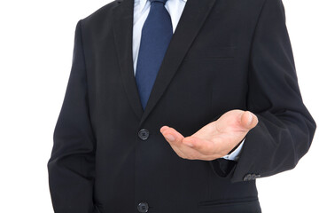 A man in a black suit makes an upward gesture with his hands