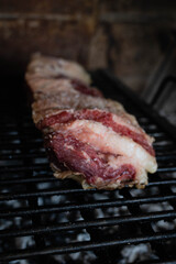 carne de vaca asada en parrilla a las brasas tipico y tradicional argentina cordoba reunion familiar 