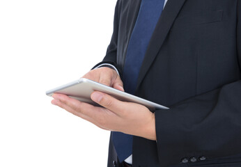 Close-up shot of a man in a black suit holding a tablet