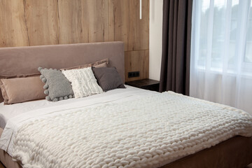 Interior of white and gray cozy bedroom