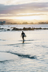 Surfers walking out at Coolangatta Queensland