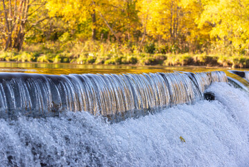 Old Mill dam at Humber River in Autumn, Toronto, Ontario, Canada