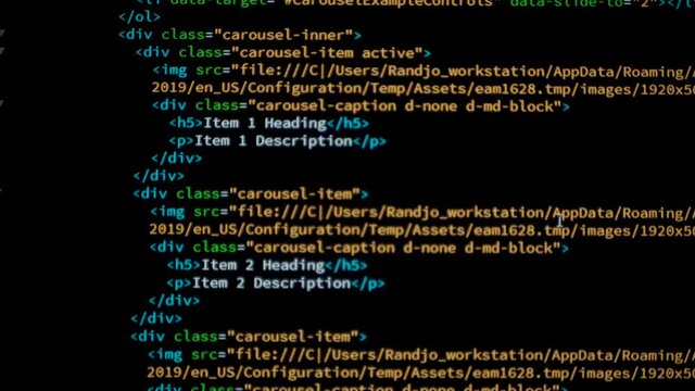 Developer is browsing html code on the computer screen. HTML Web Page Code Scrolling Programming code abstract technology background for software developer and Computer script concept.Scene E.