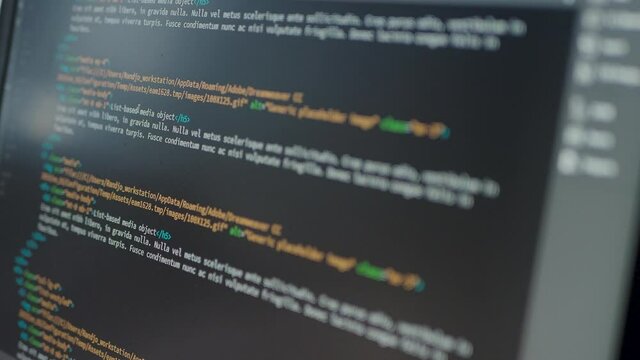 Developer is browsing html code on the computer screen. HTML Web Page Code Scrolling Programming code abstract technology background for software developer and Computer script concept.Scene B.