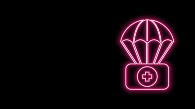 Glowing neon line Parachute with first aid kit icon isolated on black background. Medical insurance. 4K Video motion graphic animation